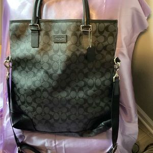 Black monogrammed Coach men’s bag